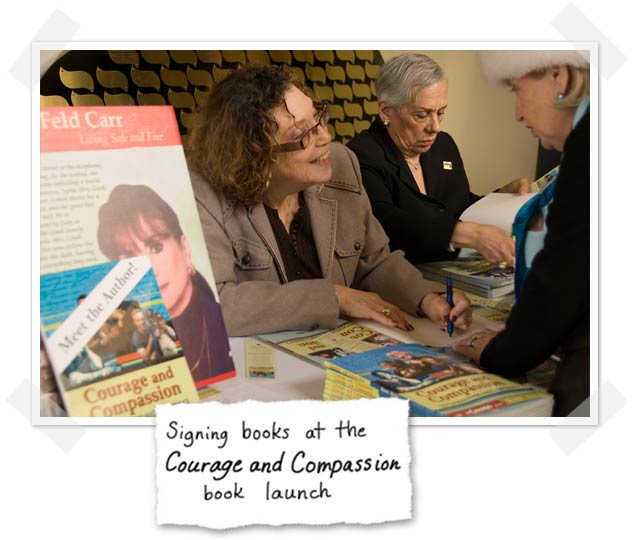Rona Arato signing books at the Courage and Compassion book launch